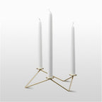 Geometric Metal Three-Candle Holder on a clean background.