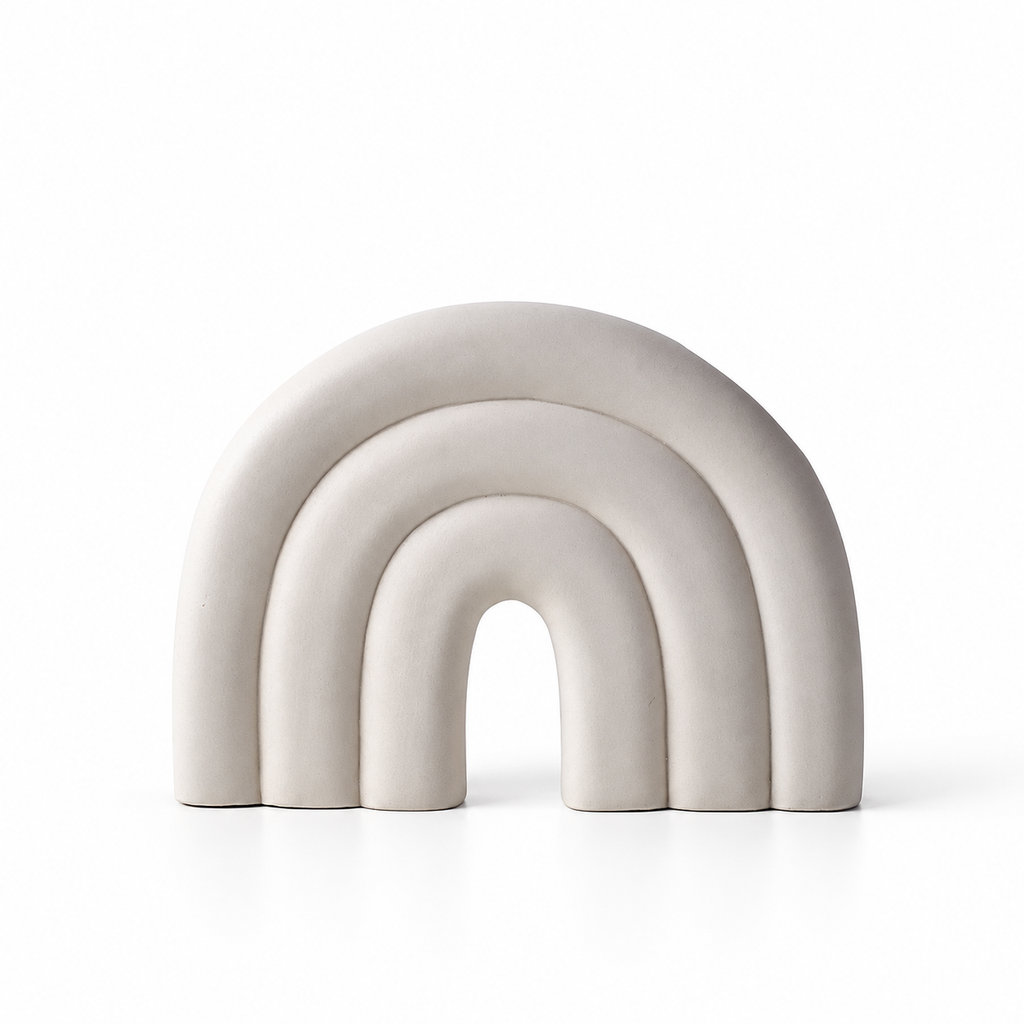 White ceramic arch decorative vase on a neutral white background