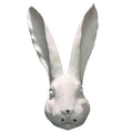 Distressed White Rabbit Head Sculpture on a white background